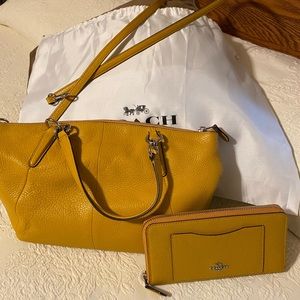 NWT. Coach Purse and wallet in mustard color